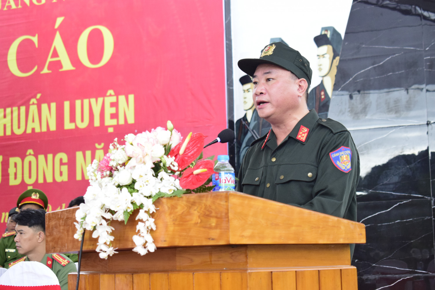 dai ta nguyen thuan pho giam doc cong an tinh bao cao ket qua cong tac huan luyen luc luong canh sat co dong nam 2023